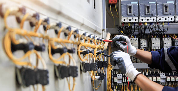 Professional Electrician technician working in State Center, IA